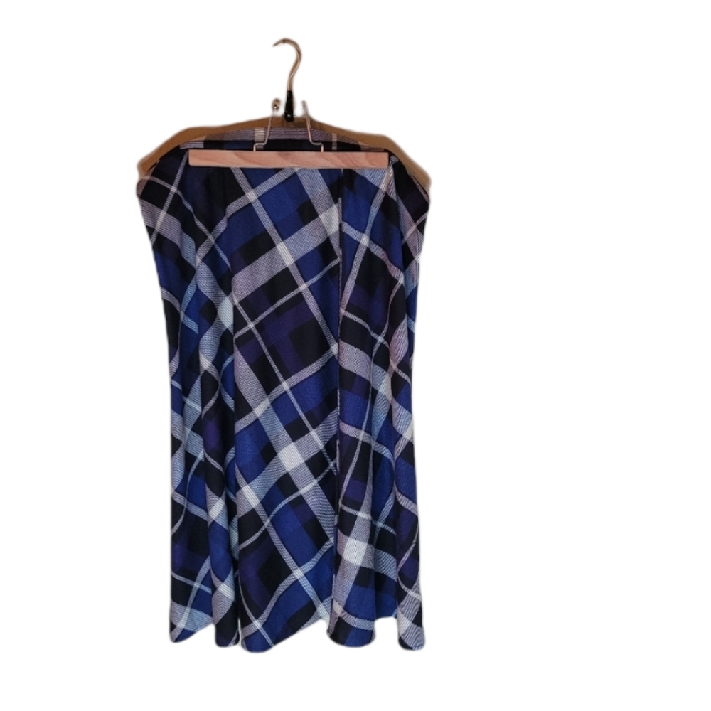 Linda Matthews purple,blue, and white plaid skirt.